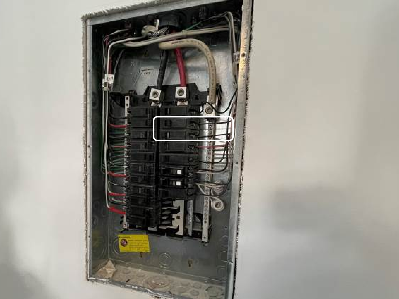 Improperly wired breaker panel in unit