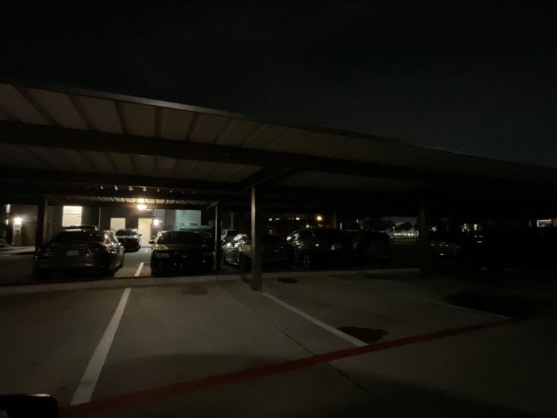Unilluminated car ports at night